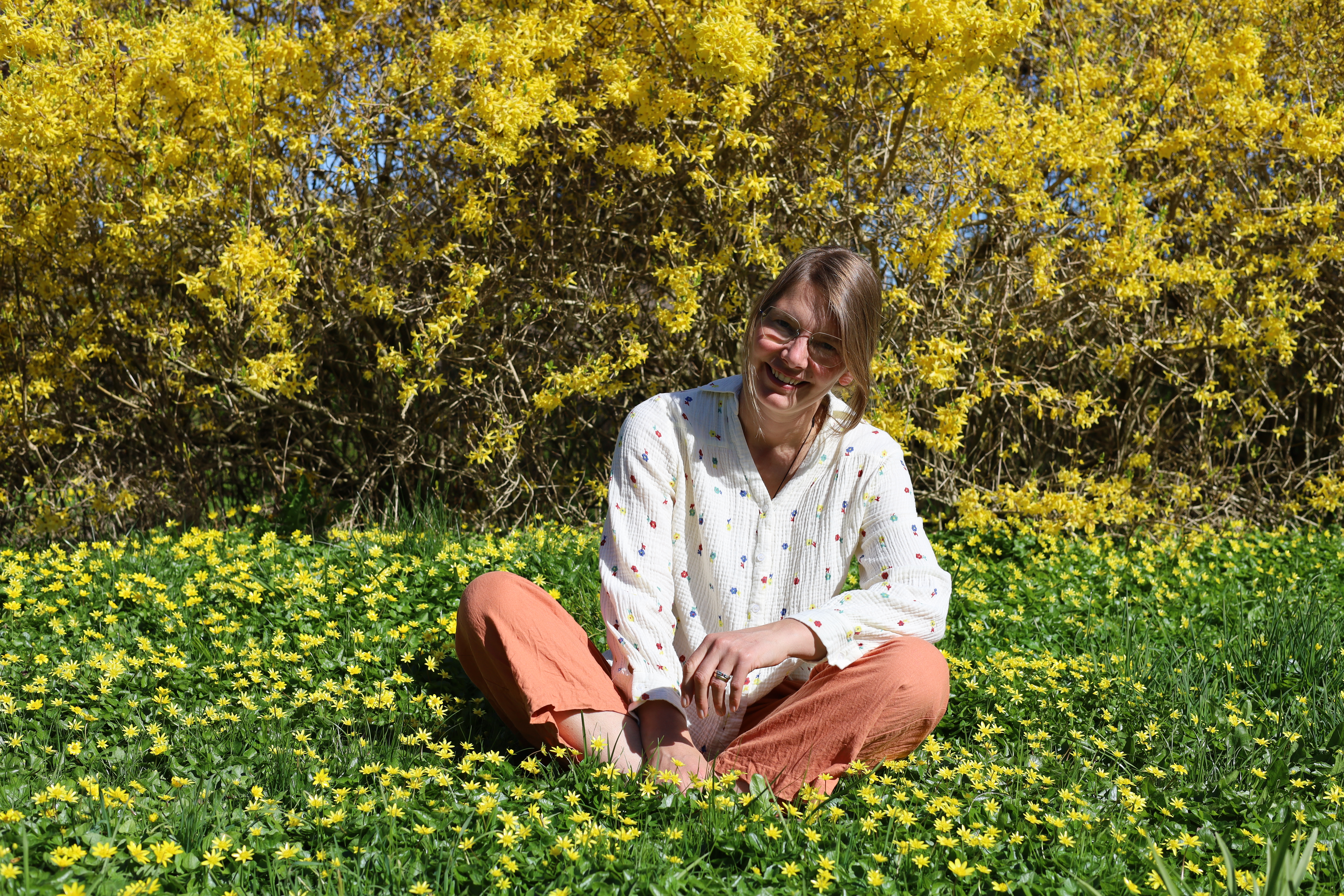 Ilona in spring flowers at Ellen Reiki